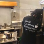 2 workers at coffee machine